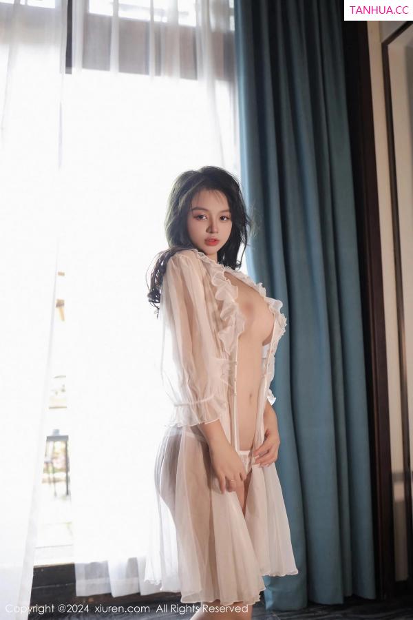   [XiuRen]高清写真图 2024.02.19 No.8106 沈思怡 妩媚美腿第39张图片